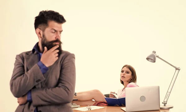 Aroused by female colleague. Office collective concept. Manager boss stand in front of girl busy with laptop. Office manager or secretary. Sexy hot lady office worker. Sexy personal secretary — Stock Photo, Image