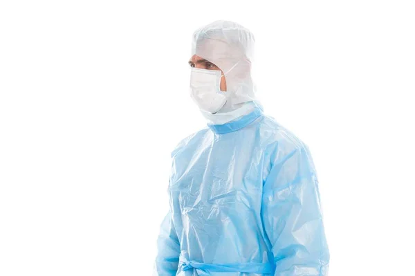 Médico de emergência usar capa máscara médica e vestido para trabalhar durante a pandemia covid-19, cuidados críticos — Fotografia de Stock