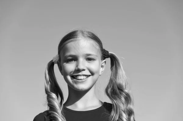 Cheerful little girl adorable ponytails hairstyle outdoors, true happiness concept — Stock Photo, Image