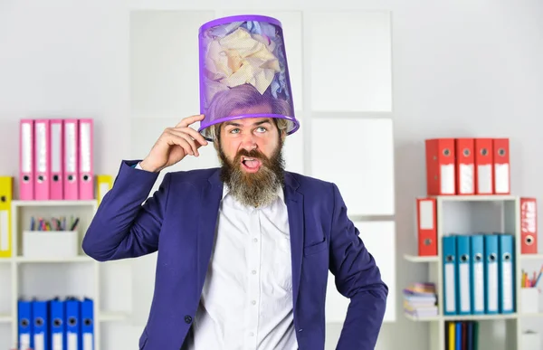 dig in work. businessman hold trashcan. man office look for lost note in paper bin. crumpled paper in wastepaper basket. man read piece of paper. office worker digging in garbage bin