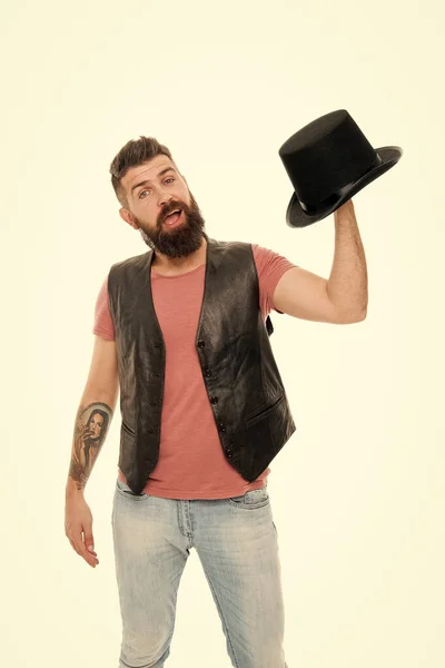 Classic is forever. Caucasian guy holding classic top hat accessory or headgear. Bearded man with classic cylinder hat. Hipster with mustache and beard with classic black hat — Stock Photo, Image
