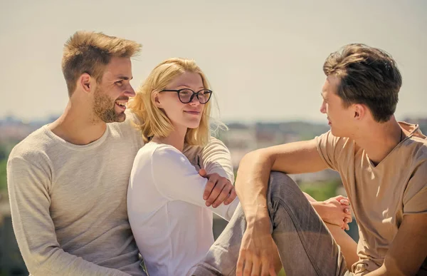 Romantic story. cheerful friends. friendship relations. family bonding and love. summer vacation. time to relax. group of people outdoor. family weekend. happy girl and two men — Stock Photo, Image