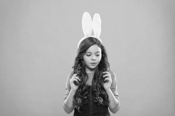 Beautify your hair today. Little girl wear bunny ears and long hair. Small child in Easter style. Beauty look of cute bunny. Hair salon. Making hair look shiny, copy space — Stock Photo, Image