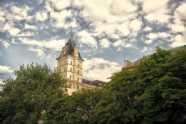 Tower on cloudy sky. High beautiful tower. Overrated tourist attractions. Building tower and spire. architecture and design. Summer city tour. Vacation destinations. Explore european architecture — Stock Photo, Image