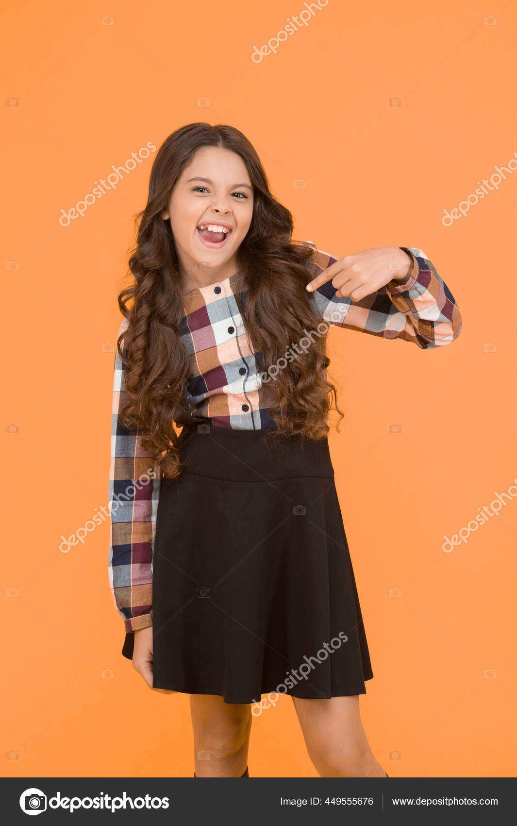 To tell the truth Retire pay Essential back to school uniform garment. Happy child pointing finger.  Little girl in formal style. Girls uniform products. School uniforms shop.  Shopping for school clothes. Buy school uniform Stock Photo by ©stetsik