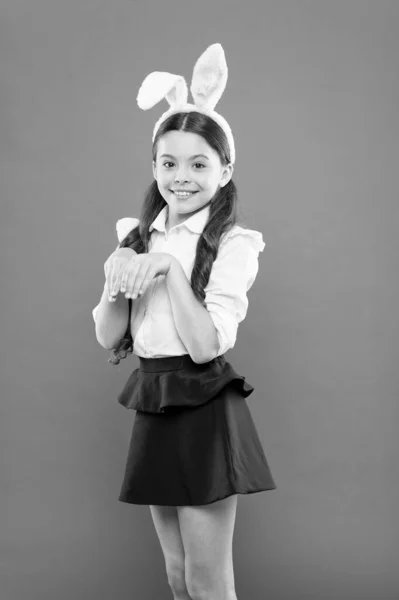 Spring season. Holiday celebration. Spring holidays. Impressive looking bunny. Little child celebrate Easter. Small child in Easter style. Cute look of bunny child. Girl child wear long rabbit ears