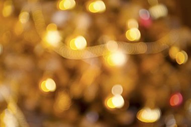 Odaklanmamış Noel ışıkları bulanık parlayan noktalar, soyut arka plan, xmas