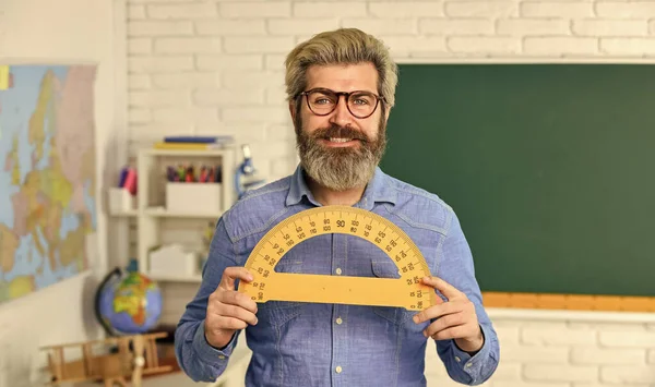 Math subject. Study mathematics. Mature bearded teacher in glasses. Education concept. Talented pedagogue. Private lesson. Back to school. Man teacher mentoring school projects. Science modern school