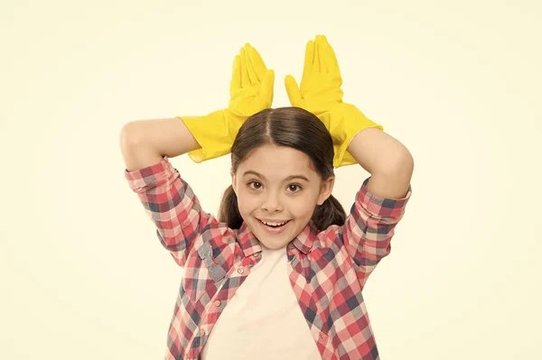 Spring cleaning. small funny girl in gloves. quality service call. independent girl housekeeping. harmless cleaning products. house cleaning service. wiping gloves for cleaning.