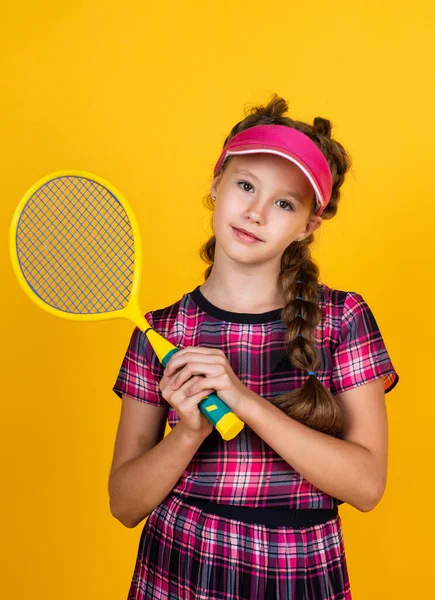 healthy sporty tween girl hold tennis racket, badminton