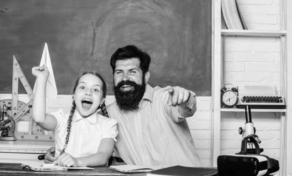 Real happiness. knowledge day. Home schooling. small girl child with bearded teacher man in classroom. private lesson. back to school. Private teaching. daughter study with father. Teachers day — Stock Photo, Image