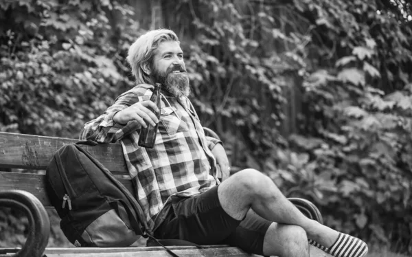 Confident student studying. online distant education. hipster inspired to work in park. agile business. student working on computer. go shopping on cyber monday. bearded man sit on bench with laptop — Stock Photo, Image