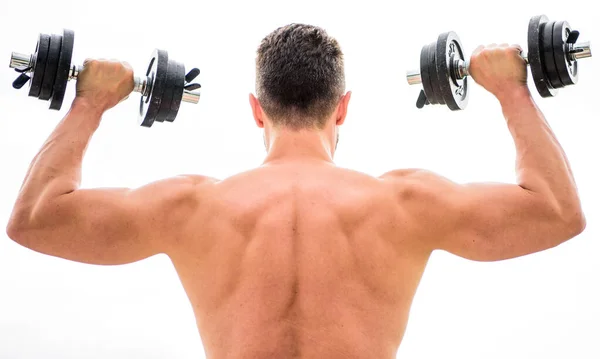 Estilo de vida deportivo. Gimnasio maniquí. Hombre musculoso ejercitándose con mancuerna vista trasera. El dolor es temporal, el orgullo es para siempre. Deportista con espalda y brazos fuertes. Equipamiento deportivo. Culturismo deporte —  Fotos de Stock