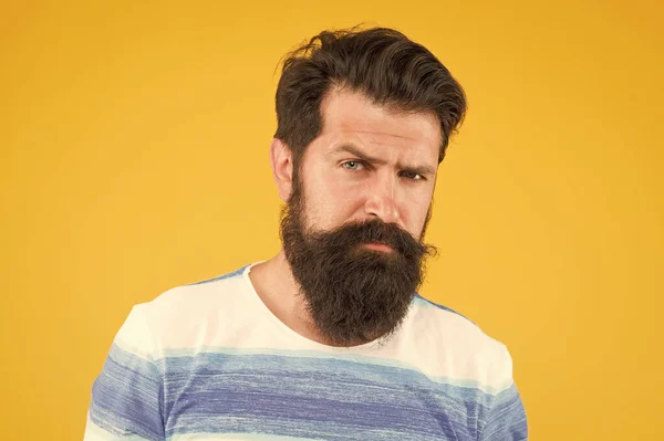 Brutal bearded man on yellow background. male summer fashion. mature hipster has perfect moustache. serious looking guy. male barber care. get style in barbershop. bright life living — Stock Photo, Image