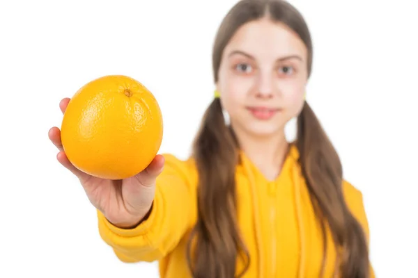 Citrus orange fruit full of vitamins in hand of child with isolated on white selective focus, orange — Stock Photo, Image