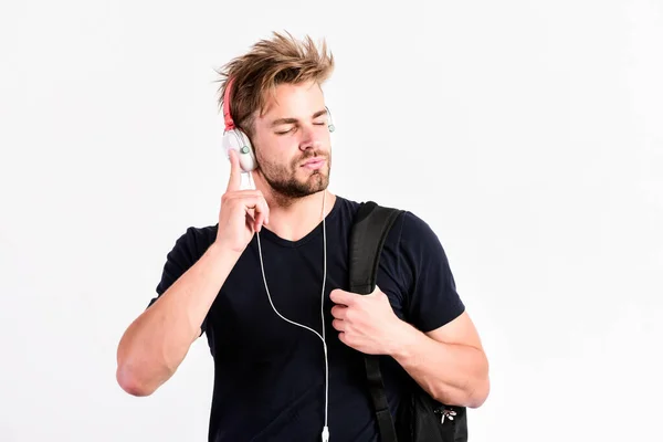Music in heart. unshaven man listening music in headset. sexy muscular man listen sport music. man in earphones isolated on white — Stock Photo, Image