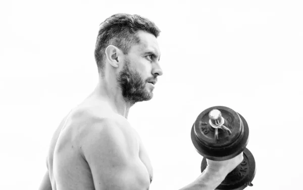 Der Preis von Größe ist Verantwortung. Hantelgymnastik. Muskelkräftiger Mann beim Training mit der Hantel. Sportler mit kräftigem Oberkörper. Fitnessgeräte. Fitness und Bodybuilding Sport. Fitness-Trainingskonzept — Stockfoto