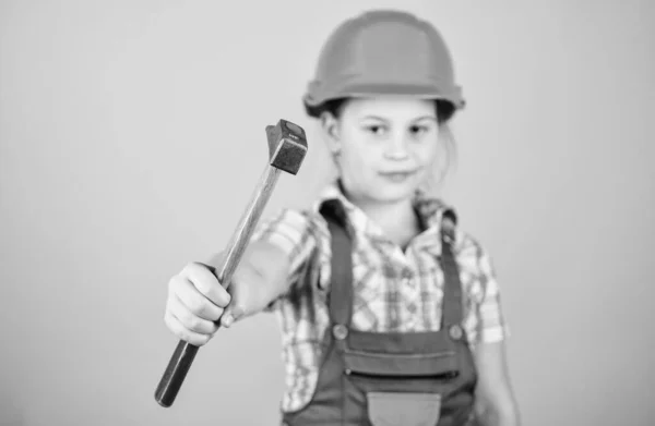 Tools to improve yourself. Child care development. Future profession. Builder engineer architect. Kid builder girl. Build your future yourself. Initiative child girl hard hat helmet builder worker — Stock Photo, Image