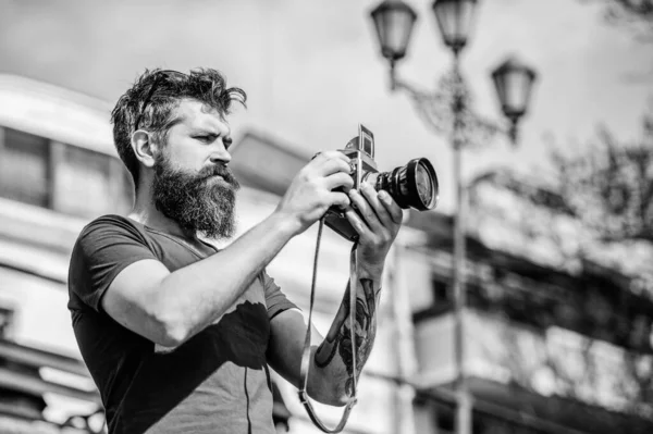 Manual settings. Photographer hold vintage camera. Modern blogger. Content creator. Man bearded hipster photographer. Photographer with beard and mustache. Man with long beard shooting photos — Stock Photo, Image