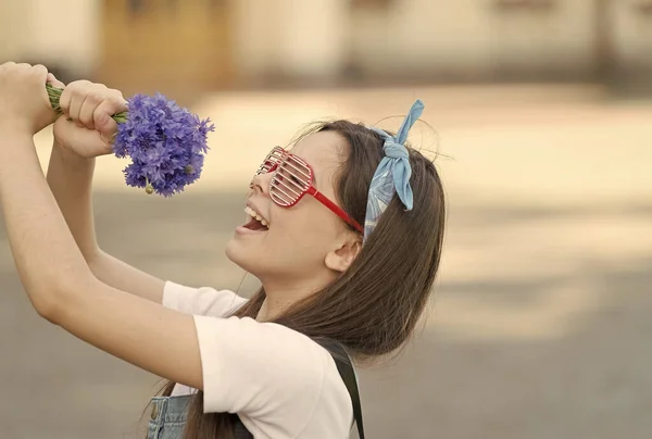 Summer song. Happy girl hold flowers as microphone. Flower shop. Flower arranging. Floral shop. Celebrating holidays. Florist shop. Shop elegant flowers. Bouquets and gifts for any events