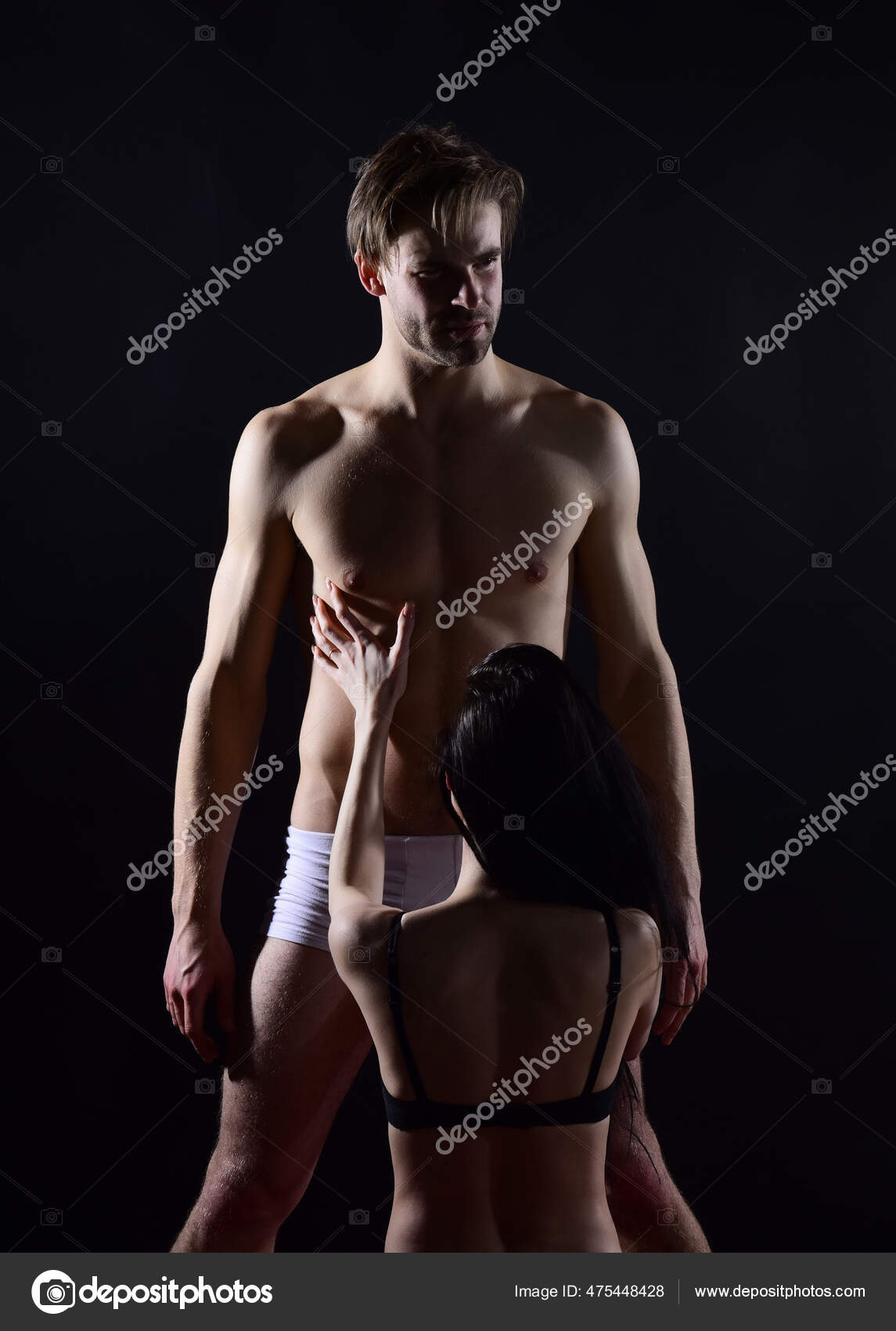 Sensual man and woman play naked sex games in bed with passion, heterosexual Stock Photo by ©stetsik 475448428 image photo