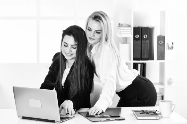 Friendly administrative workers. Digital marketing. Marketologist girls colleagues. Marketing Promotions Specialist. Marketing agency. Media Researcher and Project Manager. Friendship at work