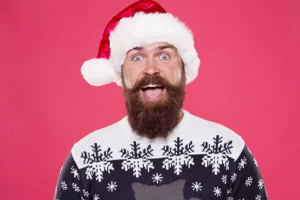 Real feelings. christmas time. happy bearded man santa hat. brutal hipster favorite sweater red background. winter holiday fun. happy face mustache. portrait of santa man with beard. new year party — Stock Photo, Image