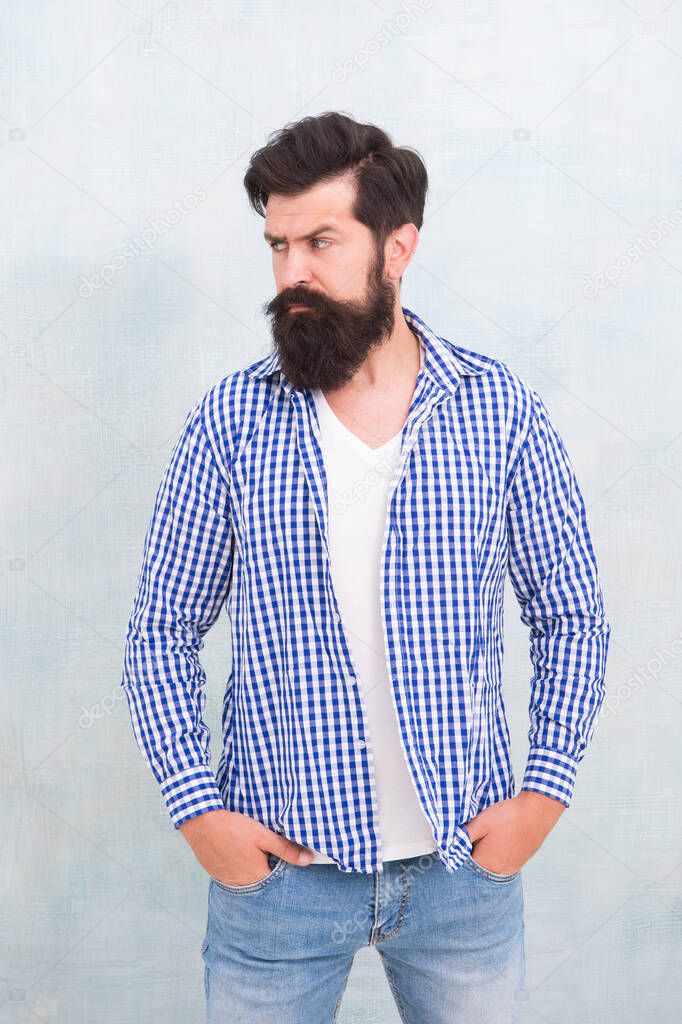 Bearded man seriously tuned. Denim look. Male casual fashion style. barber care for real men. brutal hipster with mustache. Mature hipster with beard. confident in his style