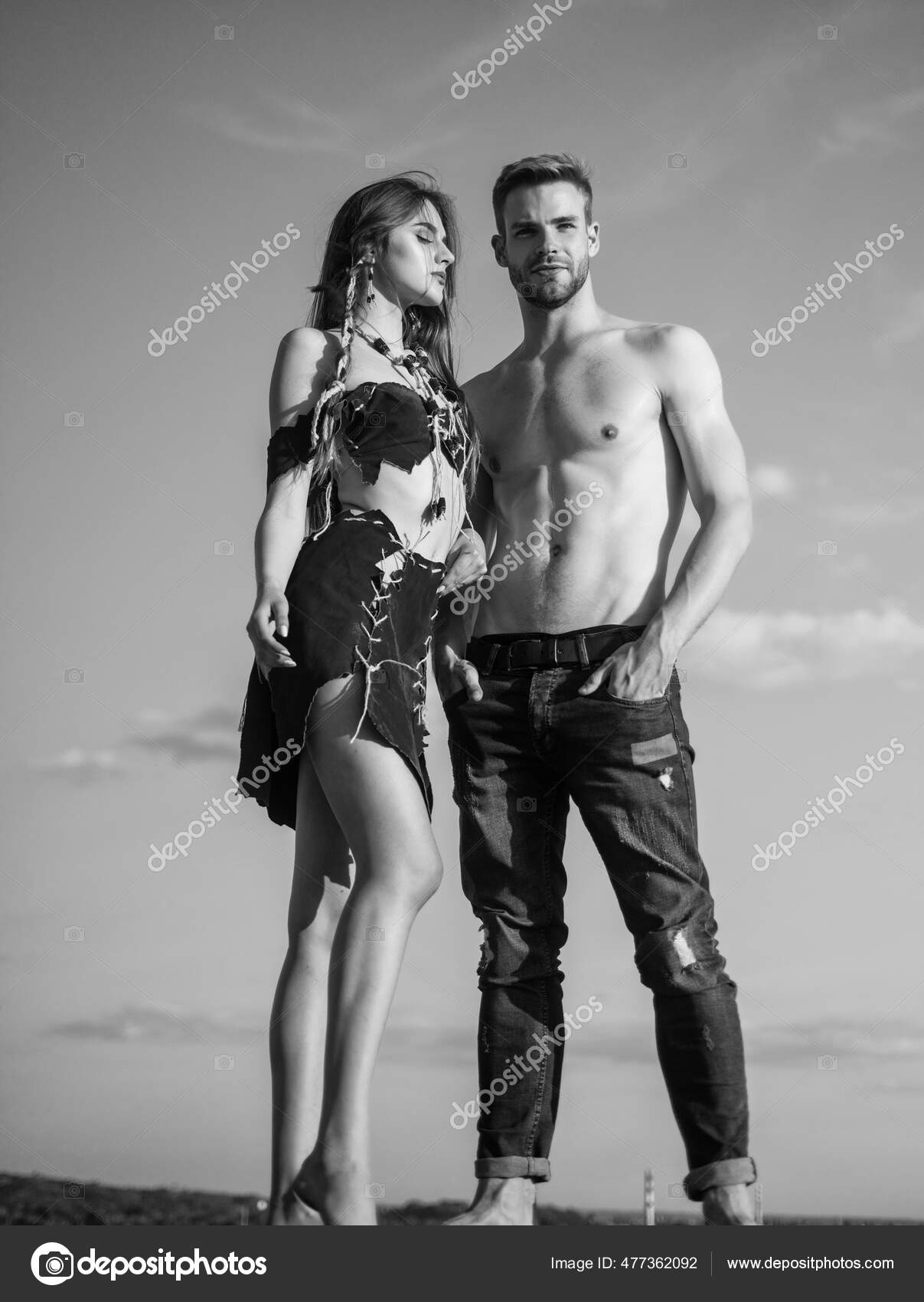 Romantic relationship concept. hot summer weather. macho man has muscular body. sensual couple in love. sexy girl wear suede leather