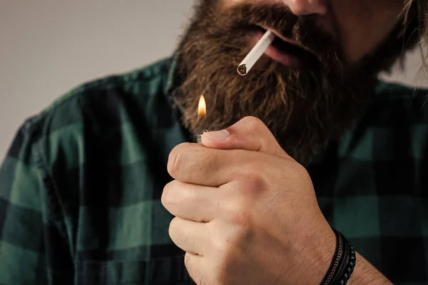 Smoking is bad. Mature hipster with beard. brutal caucasian hipster with moustache. Male barber care. Bearded man. Hair and beard care. Confident handsome man smoke cigarette — Stock Photo, Image