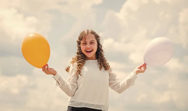 Creative idea. happy birthday party. small girl with party balloon. summer holidays and vacation. childhood happiness. feeling free and carefree. little kid in spring holiday. cheerful child have fun — Stock Photo, Image