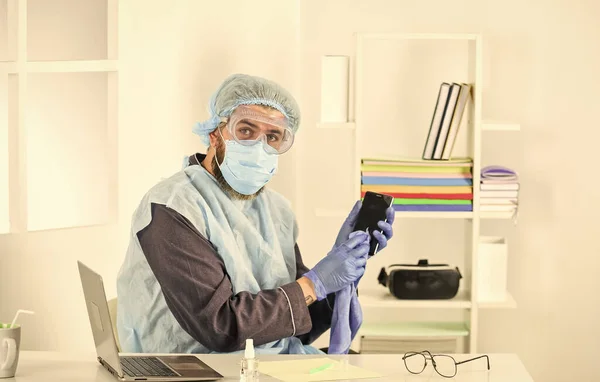 Working at home on lock down. coronavirus epidemic. social distancing. remote work with hand sanitizer and respirator. solution against the spread of virus for quarantined employees — Stock Photo, Image