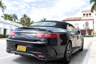 Palm Beach, Florida USA - March 21, 2021: black Mercedes Benz S 560 AWD 4MATIC luxury cabriolet car