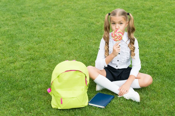 You deserve a lollipop today. Girl child eat lollipop. Sweet food. Candy eating. Taste the rainbow — Stok fotoğraf