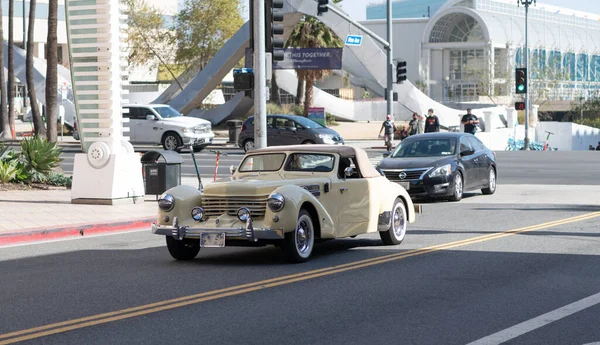 Long Beach, California USA - April 12, 2021: antique beige retro vintage car cabriolet front view. — Photo