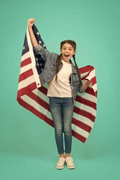 Little american girl. National holidays. Independence celebration. Happy child. Independence day holiday. Americans celebrate independence day. Little girl with USA flag. Patriotic concept. 4 of July