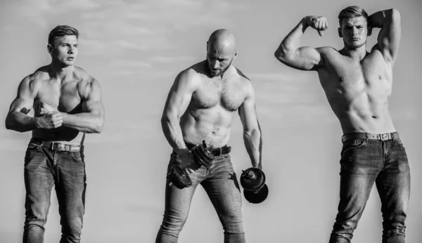 Healthy lifestyle. sport coach use barbell or dumbbells. gym equipment. stay healthy and energetic. bodybuilding sport discipline. fit and strong. three muscular bodybuilders. sportsman men training — Stock Photo, Image