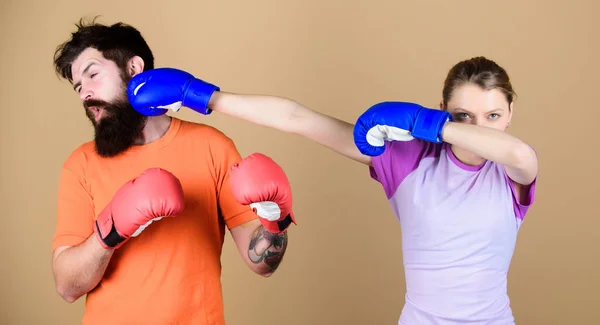 Amateur boxing club. Strength and power. Family violence. Man and woman in boxing gloves. Boxing sport concept. Couple girl and hipster practicing boxing. Sport for everyone. Equal possibilities — Stock Photo, Image