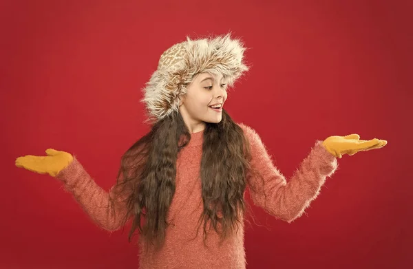 Christmas Sales. feel comfortable and cozy in any weather. winter holiday and vacation. kid in hat with ear flaps. child in knitted gloves and sweater. childhood. happy teen girl wear warm clothes — Stock Photo, Image