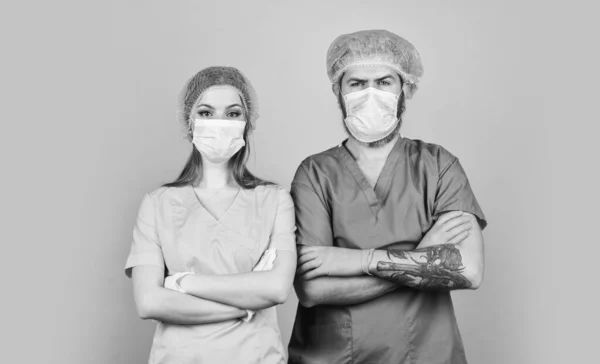 Teamwork. Nurse and doctor. Woman and man work at hospital. Private clinic. Medical workers. Health care. Surgery concept. Medical services. Virus epidemic. Medical treatment. Surgeon assistant