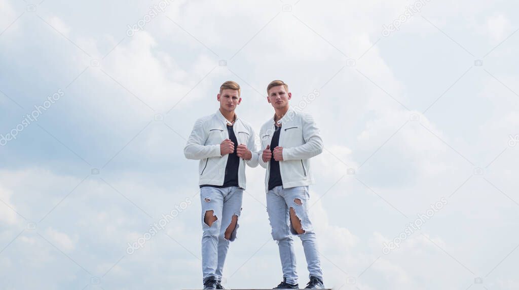 young twin brothers with similar appearance, fashion