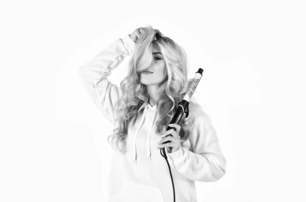 Woman with long curly hair use curling iron. Heat setting for hair type. Girl adorable blonde hold curling iron white background. Hairdresser equipment. Ceramic coating that minimizes harm — Stock Photo, Image