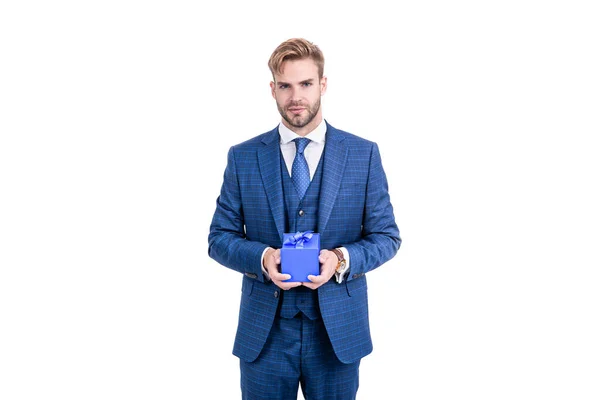 Successful businessman in businesslike suit hold gift box as business reward, occasion greeting. — 图库照片