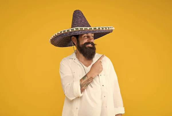 Customs and culture. Guy cheerful festive mood at party. Man in mexican hat. Explore heritage on your paternal line. Gain insight into ancestral origins. Mexican origins tradition. Ethnic origins — Stock Photo, Image