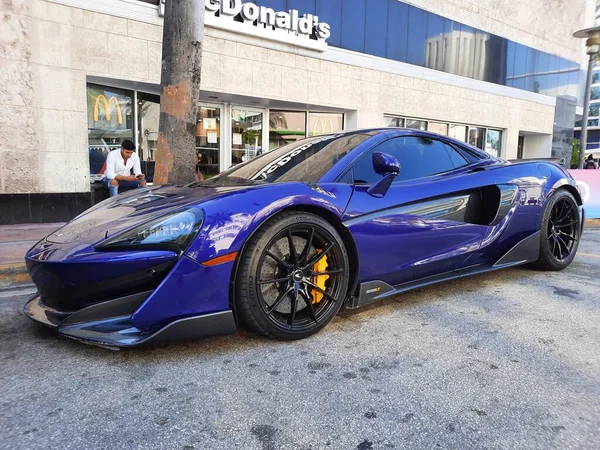 Los Angeles, California USA - March 24, 2021: blue McLaren Automotive Limited 570s side corner view. — ストック写真
