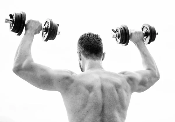 Voller Energie. Mann Sportler Gewichtheben. Steroide. Fitness- und Sportgeräte. Muskelkräftiger Rückenprotz beim morgendlichen Training mit der Langhantel. Athletischer Körper. Hantelturnen. Gesunder Lebensstil — Stockfoto