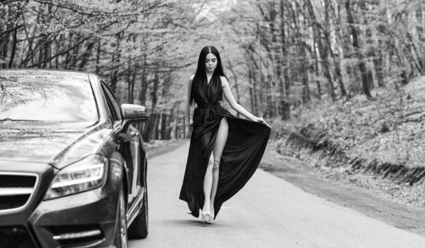 Road travel. Summer vacation. Traveling and journey. Leisure and pleasure travel. Sexy style of trendy woman with long legs. Travel and vacation. Road trip. Travel girl. Transport and transportation