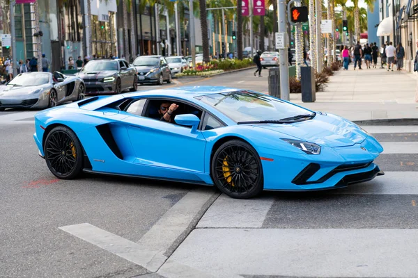 Los Angeles, California USA - April 11, 2021: blue Lamborghini Aventador side view. — Foto de Stock