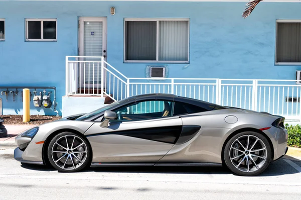 Los Angeles, California USA - April 13, 2021: silver gray McLaren Automotive Limited 570s side view. — Stockfoto