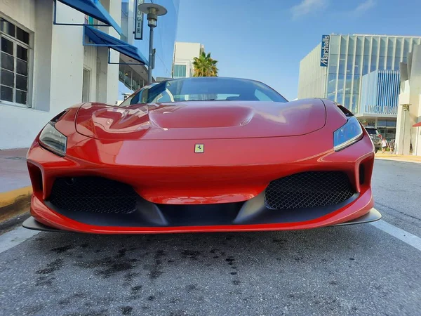 Los Angeles, California USA - March 24, 2021: red Ferrari F8 Tributo luxury sport car low front view — ストック写真